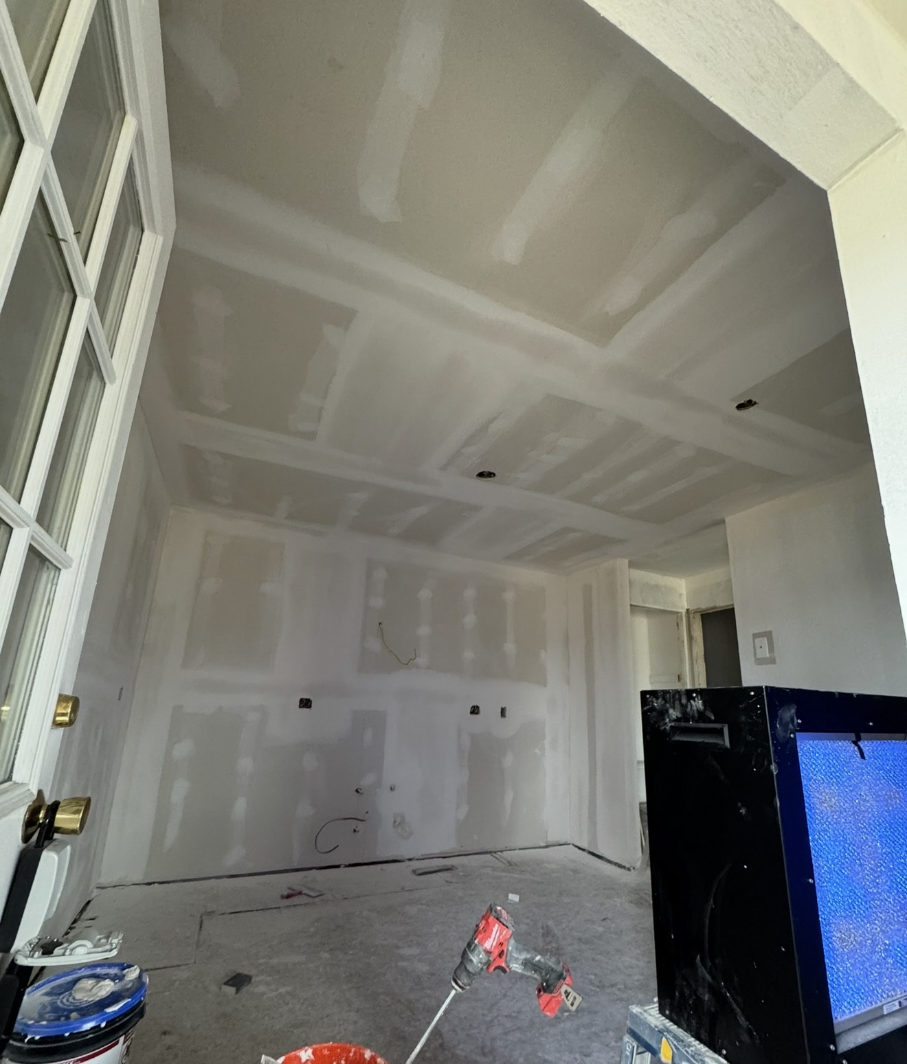 Room drywall finishing in progress