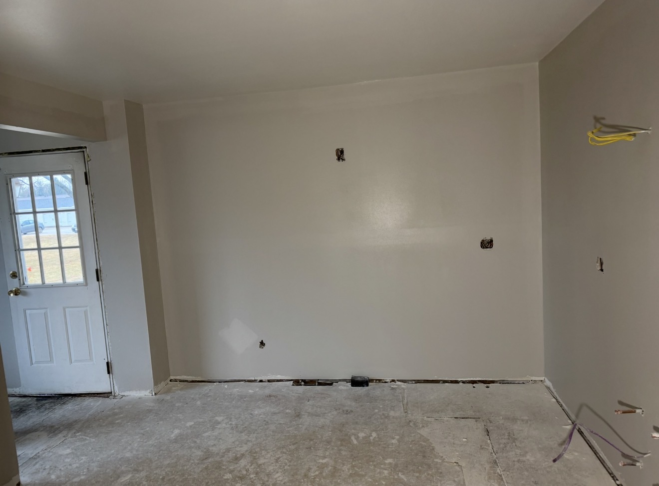 Finished room wall after drywall and painting